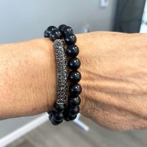 Two black beaded bracelets with crystals